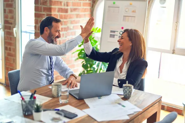 Happy client celebrating business growth